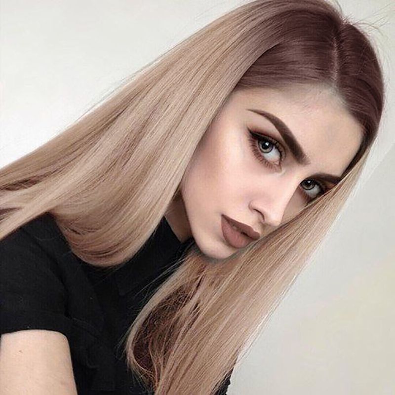 26 inch synthetic blonde wig demonstrating natural flow and middle part from side perspective