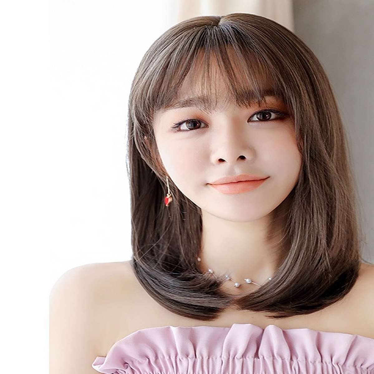 Brown straight synthetic wig 45cm length with face-framing bangs and sleek natural finish