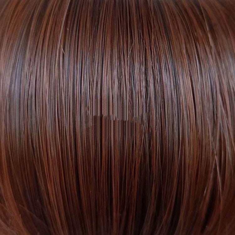 Brown synthetic hair strands texture detail displaying natural wave pattern and quality construction