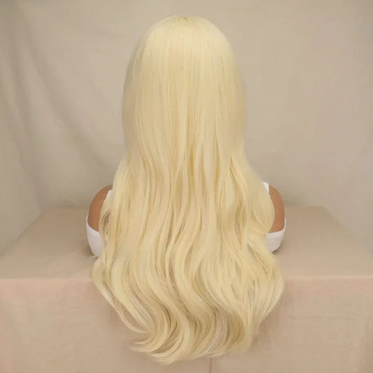 Back angle showing flowing locks with gentle waves at ends, elastic band visible