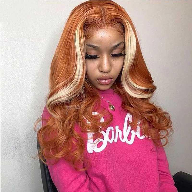 Woman wearing long wavy honey blonde 613 human hair lace closure wig with natural movement