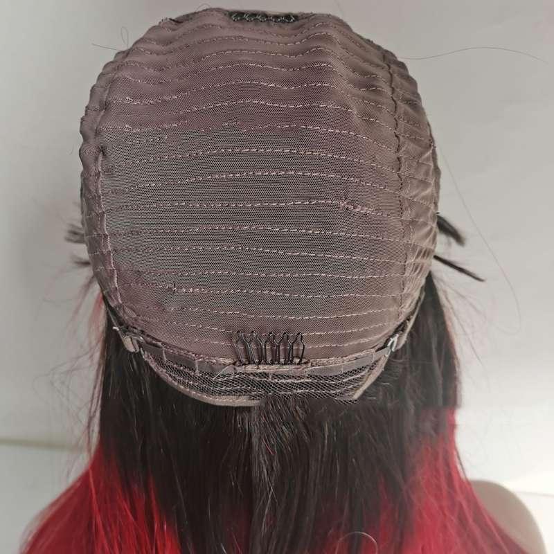 Vibrant red straight wig on mannequin head displaying quality construction and heat-resistant human hair