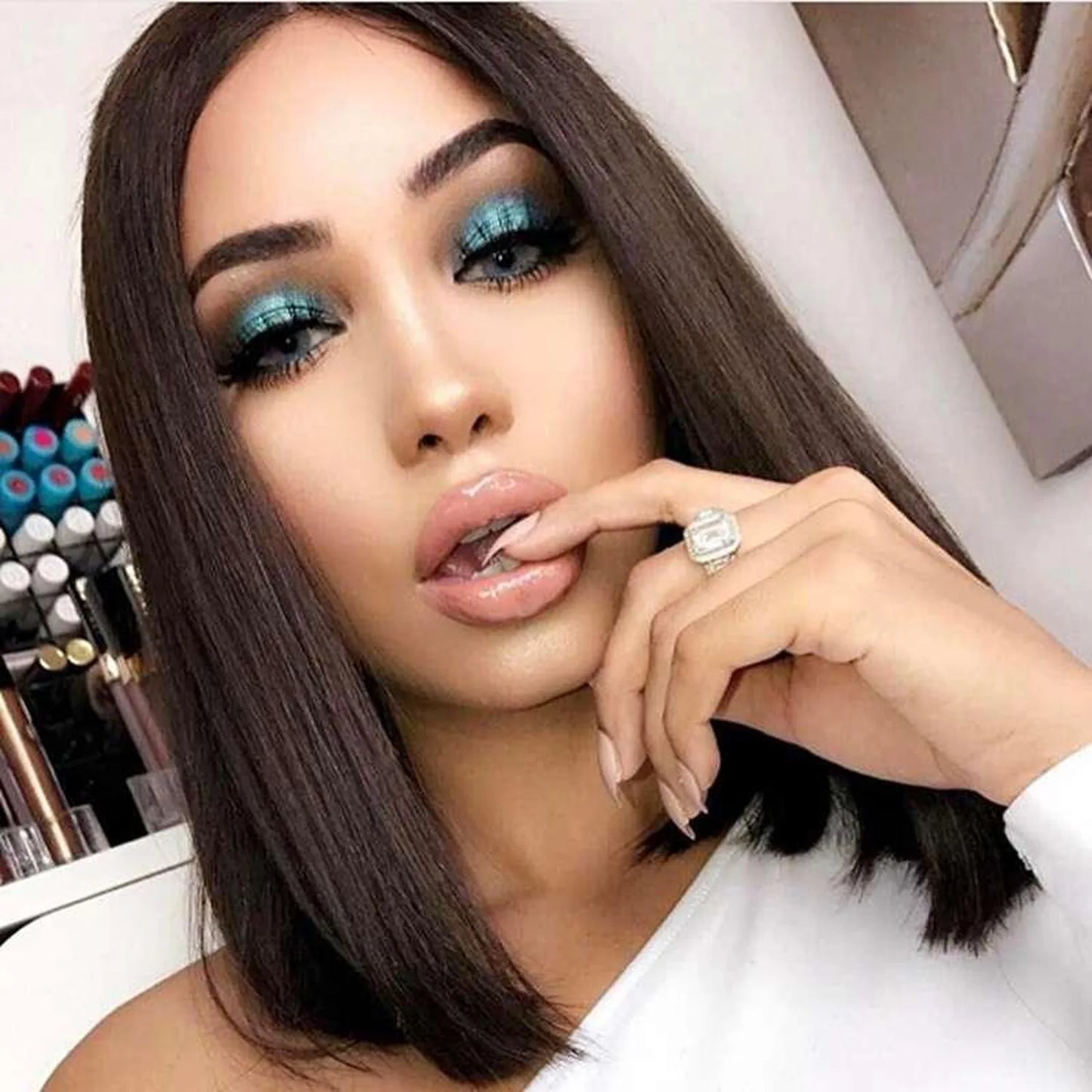 Natural black heat resistant bob wig silky straight pre-styled shake and go side angle