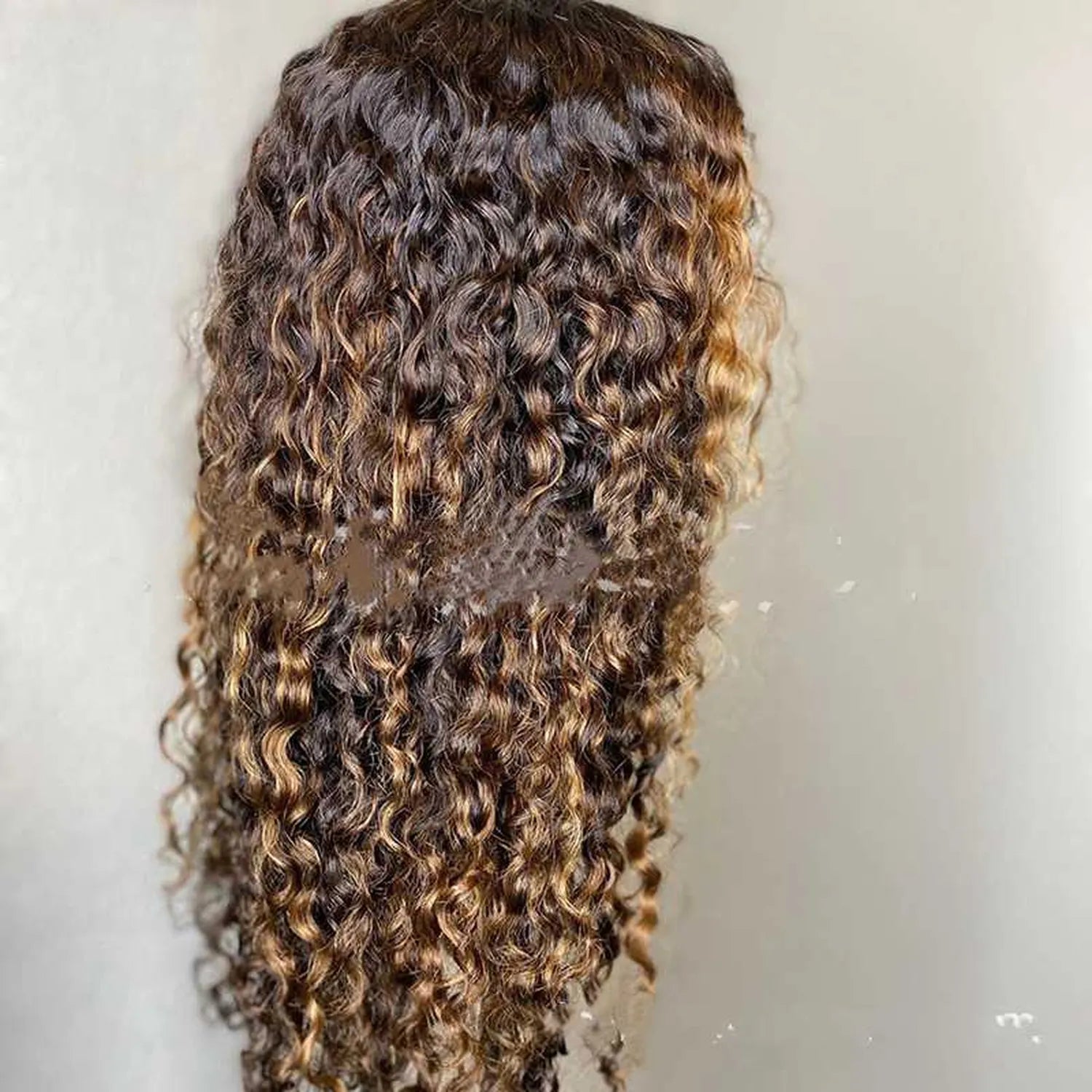 Curly fiber texture tight spiral pattern brown tones detail view quality construction kanekalon