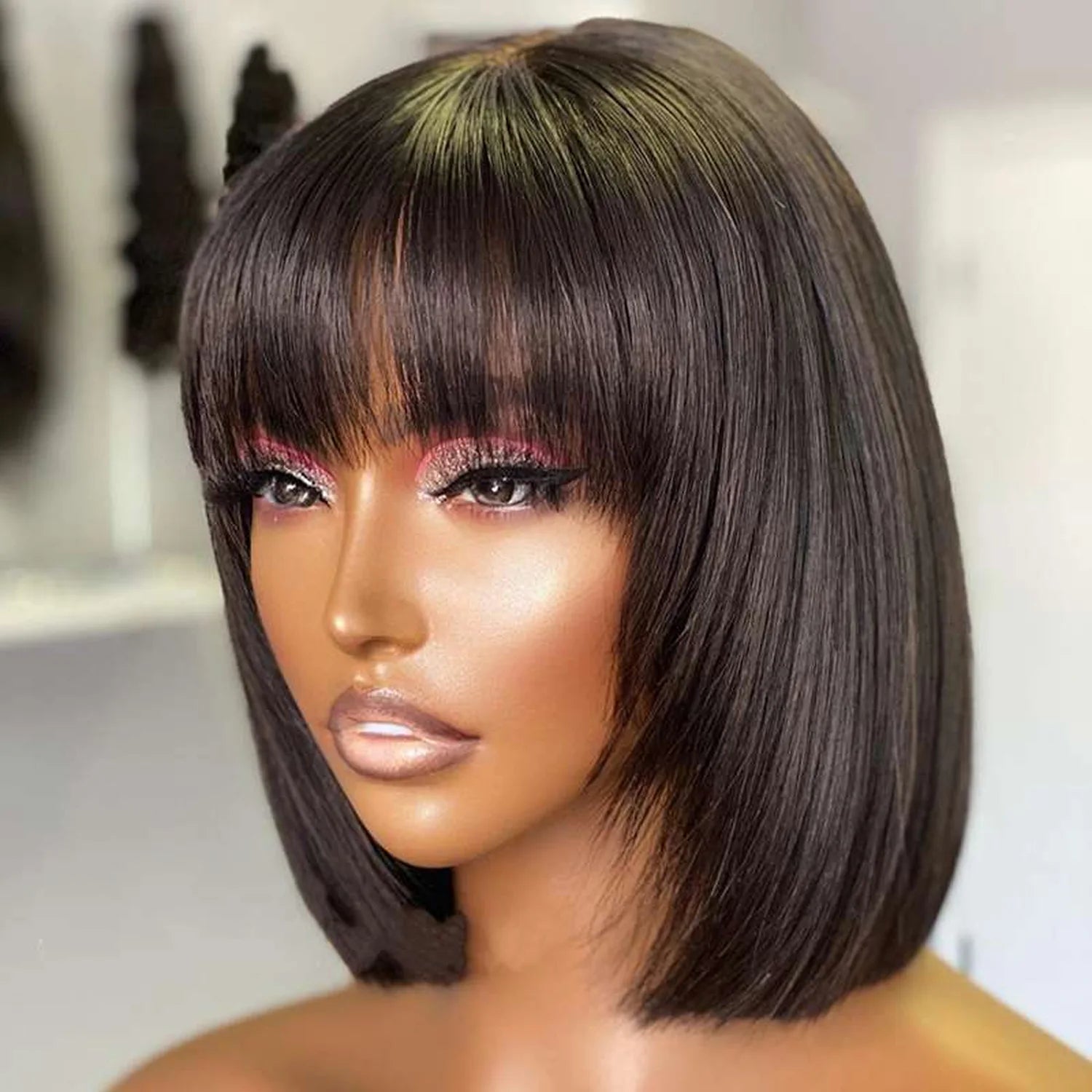 Bob wig with bangs human hair natural black chin length side view realistic