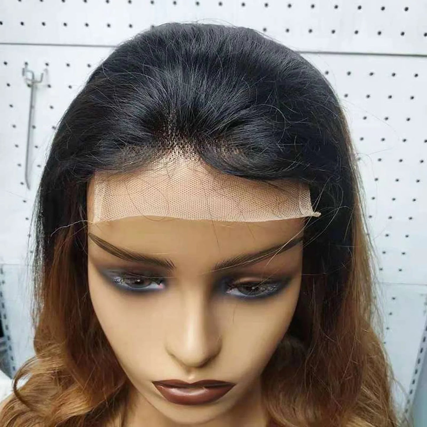 HD lace wig closeup natural hairline ombre black blonde wavy realistic texture