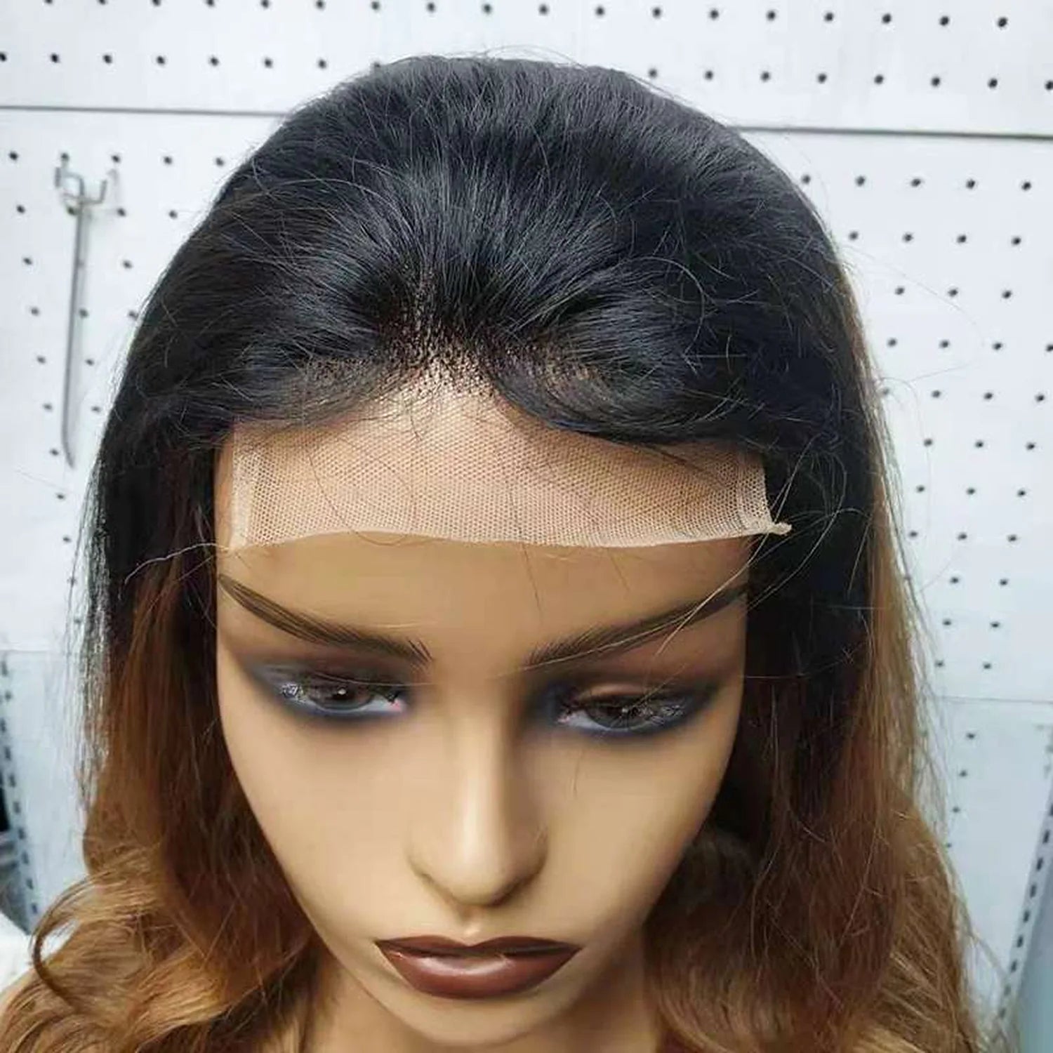 HD lace wig closeup natural hairline ombre black blonde wavy realistic texture