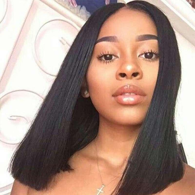 Straight black bob wig with natural movement and realistic appearance shown on model
